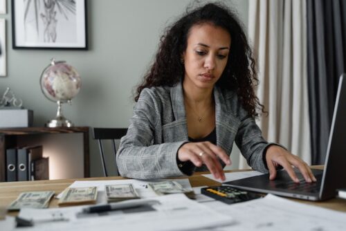 woman calculating money