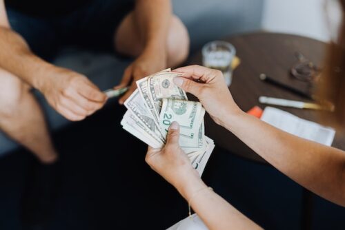 person counting money