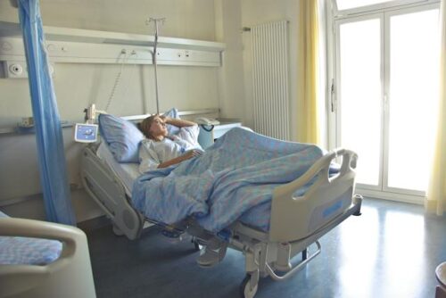 woman laying in a hospital bed