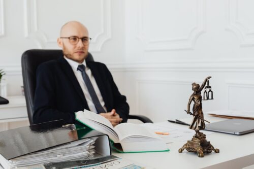 attorney sitting at desk