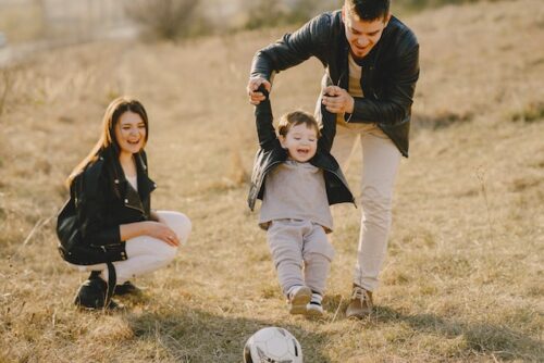 family playing with child