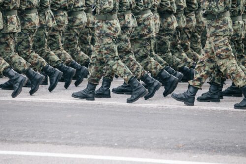 people marching in uniform